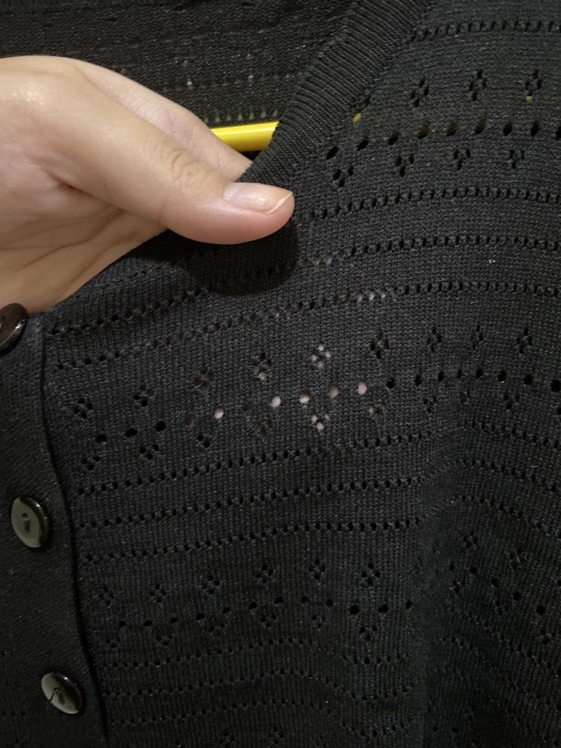 Black Cropped Button-Up Cardigan with Puff Sleeves (Category: Coats, Jackets and Outerwear) located in Pasig City. Submitted by alaineeeee (Listing ID 1462772712, Image 2). Description: - Black cropped cardigan - Short puff sleeves - Button-up front - Textured knit with cut-out details - Versatile: wear open or closed - Ideal for layering over tops or dresses.