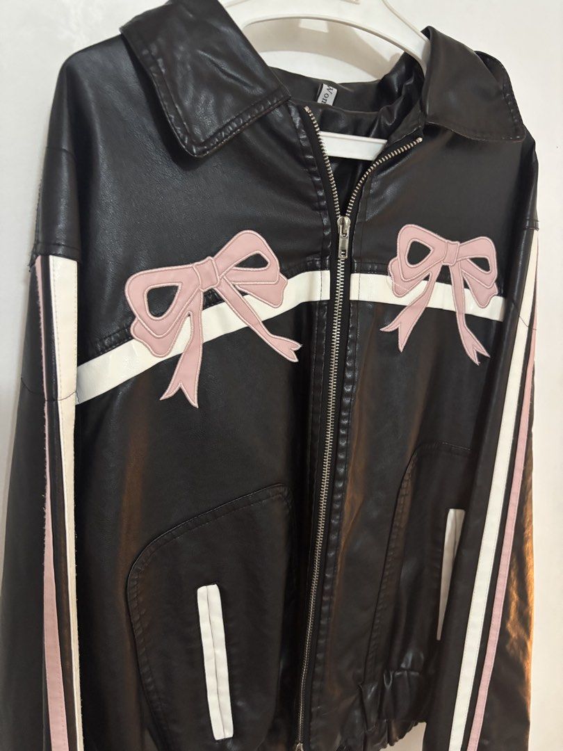 Black Faux Leather Jacket with Pink Bows (Category: Coats, Jackets and Outerwear) located in Iligan City. Submitted by boldrabbit.778b7e (Listing ID 1462767449, Image 1). Description: ‼️ DM FOR DETAILS ‼️.