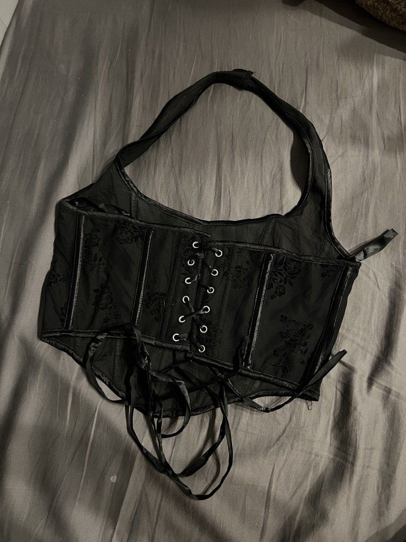 Black Floral Mesh Corset Halter Top (Category: Sleeveless) located in Paranaque City. Submitted by dubaichocolei (Listing ID 1462738052, Image 2). Description: - Black mesh corset top - Floral pattern - Boning details - Lace-up back - Halter neck style - Versatile: pairs well with jeans or skirts - Size: S.