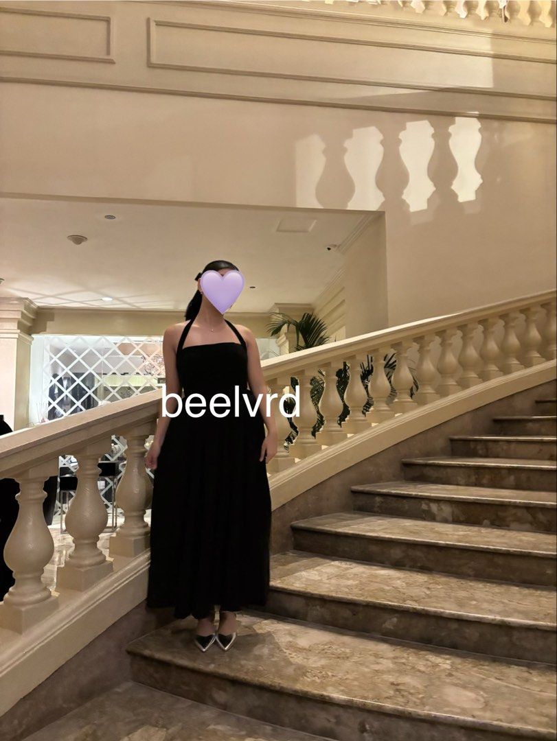 Black Halter Neck Maxi Dress (Category: Dresses) located in Manila. Submitted by beelvrd (Listing ID 1462782357, Image 3). Description: - Black halter neck maxi dress - Fitted top with a flowy skirt - Ties at the neck for adjustable fit - Satin-like finish on the skirt - Free size - Worn once.
