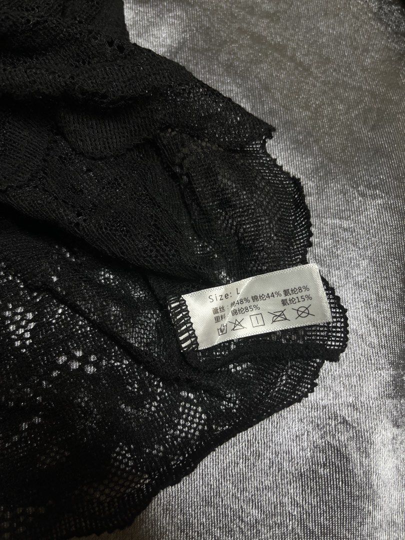Black Lace Bralette Top (Category: Sleeveless) located in Cavite. Submitted by bellewii (Listing ID 1462842185, Image 3). Description: - Elegant black lace bralette top - Delicate scalloped edges on straps and hem - Built-in cups for comfortable support - Perfect for wearing as a standalone top or for layering - Crafted from a soft polyester and spandex blend size: med to large.