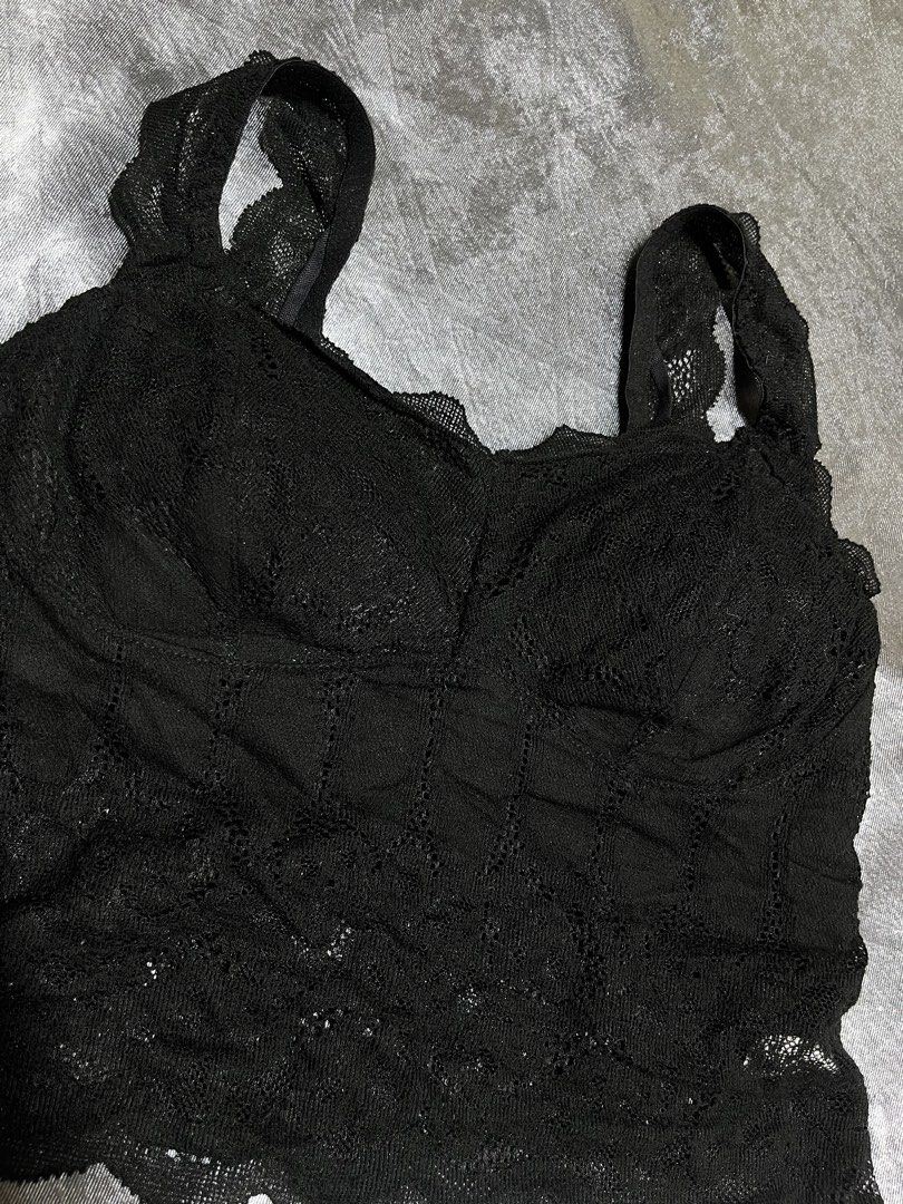 Black Lace Bralette Top (Category: Sleeveless) located in Cavite. Submitted by bellewii (Listing ID 1462842185, Image 2). Description: - Elegant black lace bralette top - Delicate scalloped edges on straps and hem - Built-in cups for comfortable support - Perfect for wearing as a standalone top or for layering - Crafted from a soft polyester and spandex blend size: med to large.