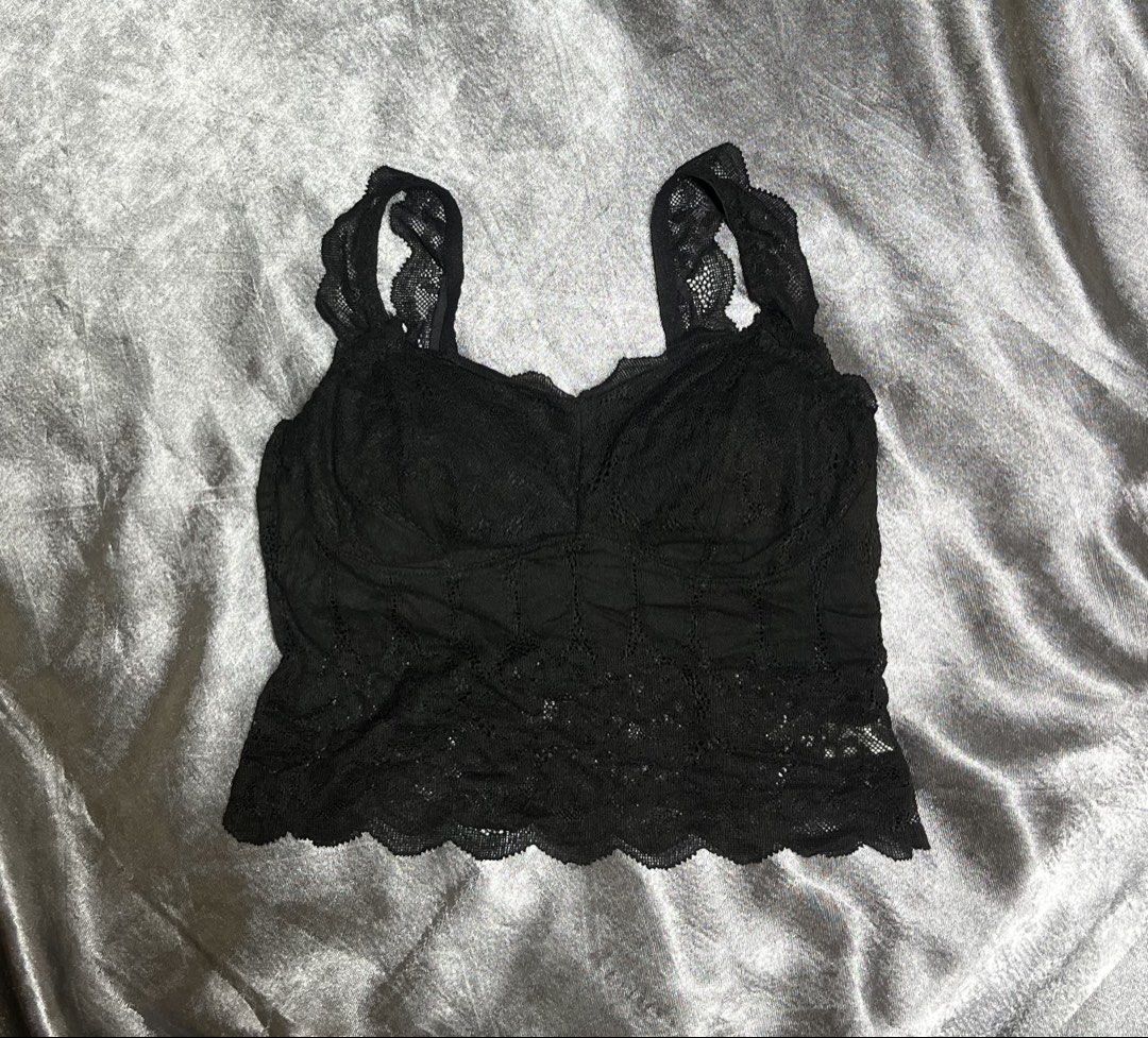 Black Lace Bralette Top (Category: Sleeveless) located in Cavite. Submitted by bellewii (Listing ID 1462842185, Image 1). Description: - Elegant black lace bralette top - Delicate scalloped edges on straps and hem - Built-in cups for comfortable support - Perfect for wearing as a standalone top or for layering - Crafted from a soft polyester and spandex blend size: med to large.