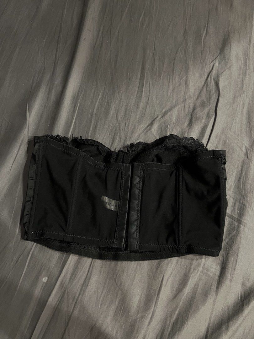 Black Lace Corset Top Size M (Category: Others Tops) located in Paranaque City. Submitted by dubaichocolei (Listing ID 1462736709, Image 2). Description: - Elegant black satin corset top - Features intricate lace detailing - Structured bodice for a flattering silhouette - Sweetheart neckline - Adjustable hook and eye closure at the back - Versatile for layering or wearing solo - Comfortable and stylish design.