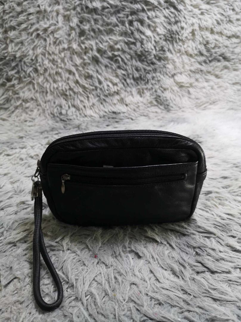 Black leather Zipper Closure Wrist Strap Wristlet (Category: Belt bags, Clutches and Pouches) located in Santa Cruz. Submitted by jmy_surplus.2 (Listing ID 1462793664, Image 1). Description: Size ; L - 6 W - 8.6 Color ; Black Type ; Wristlet Brand ; No brand Material ; Leather Style ; Black leather Wristlet LR 129 JMY 5 Batch #222.