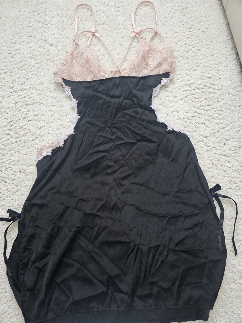 Black mini nightgown with light pink lace (Category: Undergarments & Loungewear) located in Marikina City. Submitted by lalala60325 (Listing ID 1462855572, Image 1). Description: XS-S - Gorgeous black and pink babydoll lingerie - Features delicate lace detailing on the bust and sides - Adjustable straps for a perfect fit - Side ties for a customizable look .