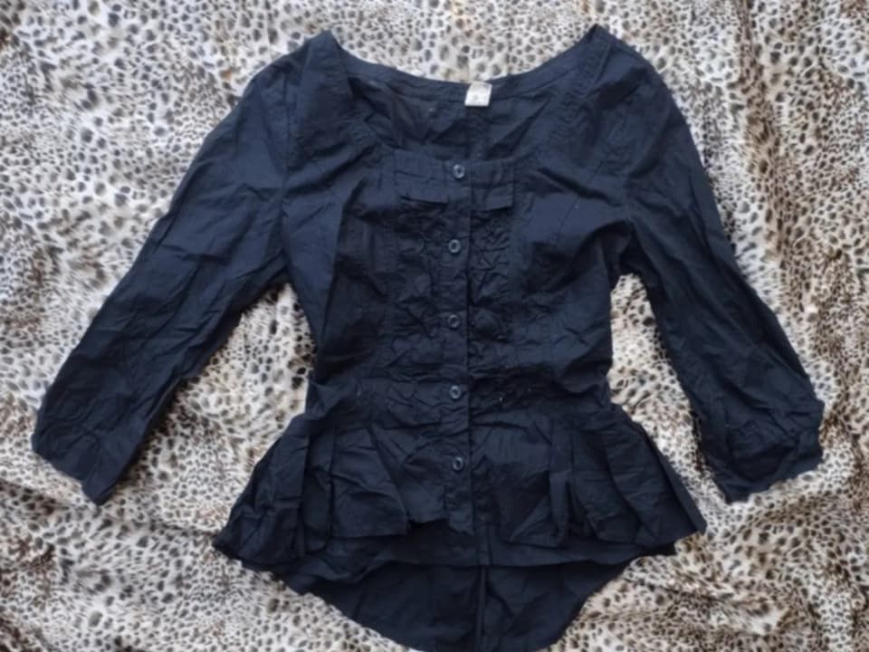 Black peplum longsleeves top (Category: Longsleeves) located in Manila. Submitted by rieries.collection (Listing ID 1462855430, Image 1). Description: xs-small TAGUIG CITY | PH BASED.