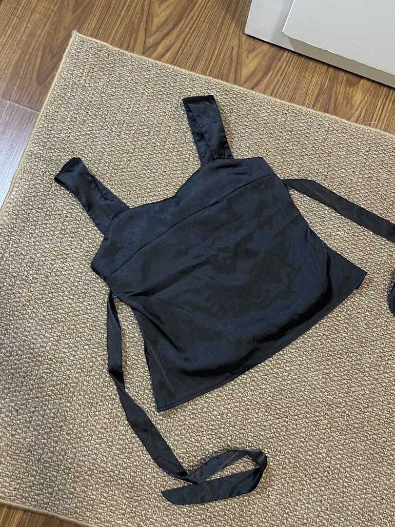 Black Satin Cami Top with Tie Back - S (Category: Sleeveless) located in Pasig City. Submitted by miafml-closet-cleanout (Listing ID 1462752412, Image 1). Description: - worn once :) posted price is fixed ♡ will not respond to hagglers. 💵 mop: gcash / bdo / maribank / unionbank 🛵 courier: any as long as arranged by buyer 🙅🏻‍♀️ no requested worn photos ❌ no meet-ups.
