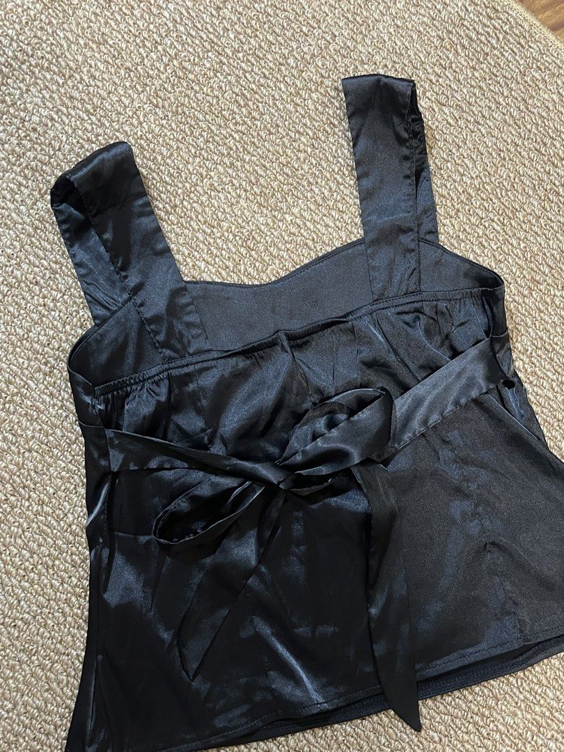 Black Satin Cami Top with Tie Back - S (Category: Sleeveless) located in Pasig City. Submitted by miafml-closet-cleanout (Listing ID 1462752412, Image 3). Description: - worn once :) posted price is fixed ♡ will not respond to hagglers. 💵 mop: gcash / bdo / maribank / unionbank 🛵 courier: any as long as arranged by buyer 🙅🏻‍♀️ no requested worn photos ❌ no meet-ups.