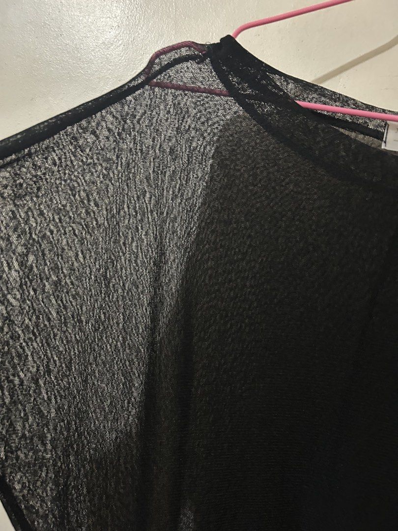 Black Sheer Mesh Top (Category: Blouses) located in Naga. Submitted by aroaldaw (Listing ID 1462794891, Image 3). Description: - Black sheer mesh fabric - Loose and airy fit - Lightweight with subtle texture - Ideal for layering (bralette/camisole) - Easy to style for casual or chic looks.