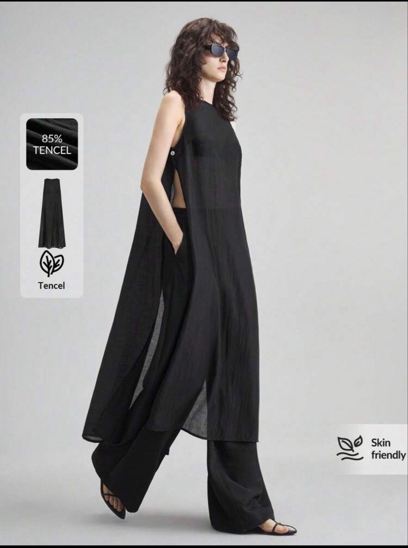 Black Sleeveless Long Blouse with Side Slits (Category: Sleeveless) located in Iloilo. Submitted by dabyladaby2 (Listing ID 1462813997, Image 2). Description: - Black sleeveless long blouse - Made with 85% skin-friendly and breathable - Relaxed fit with high side slits for easy movement - Convenient side pockets - Button closure at the back - Versatile for layering or wearing on its own - shoulder 12.6 in, bust 39.6 in , waist 39.4 in , hip- 42.5