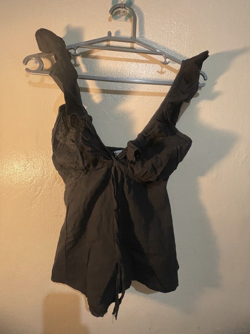 Black top with Ruffle Straps (Category: Rompers) located in Manila. Submitted by sammmm777 (Listing ID 1462787017, Image 2). Description: - Chic black romper -low v cut - Adorable ruffle straps - Flattering V-neckline - Comfortable linen-blend fabric - Ideal for casual days or beach getaways - Effortless to wear and style.