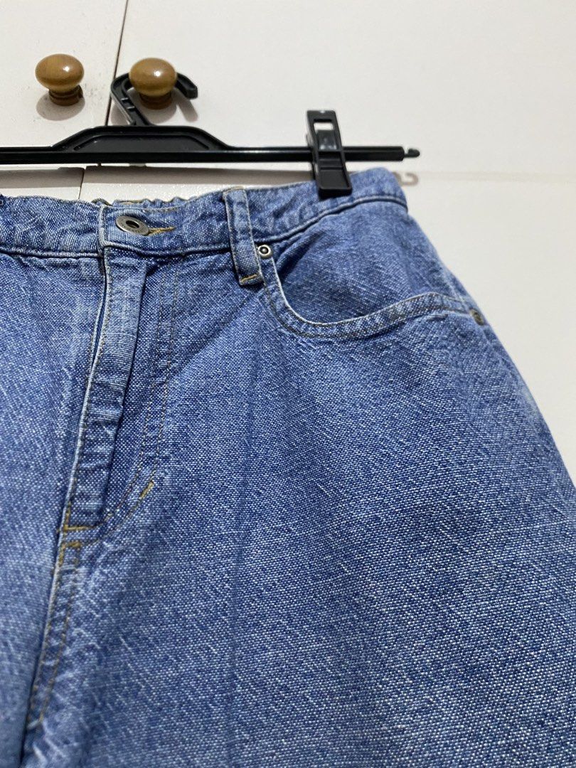 Blue Denim High-Waisted Jeans (Category: Jeans) located in Quezon City. Submitted by addy_addy (Listing ID 1462821494, Image 3). Description: - Classic blue denim jeans - High-waisted fit - Relaxed leg - Button and zip closure - Two front pockets - Two back pockets - Simple and versatile design - Perfect for everyday wear - Easy to pair with any top - Approximate measurements * Waistband: 27.5 inches * Length: 38 inches * Inseam: 28 inches * Fron