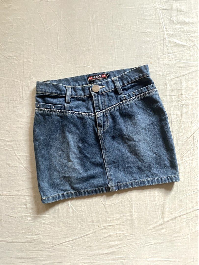 Blue Denim Mini Skirt Clean Cut (Category: Skirts) located in Manila. Submitted by yannaapril (Listing ID 1462720209, Image 1). Description: Super pretty. Nice fitting. Clean cut. No flaws Measurements: (inches) Waist - 28 Hips - 34 Length/outseam - 30 - Cute blue denim mini skirt from J.S.X. - Classic five-pocket design - Rhinestone details on front pockets and waistband - Button and zip closure - Versatile for casual or dressed-up looks Helping