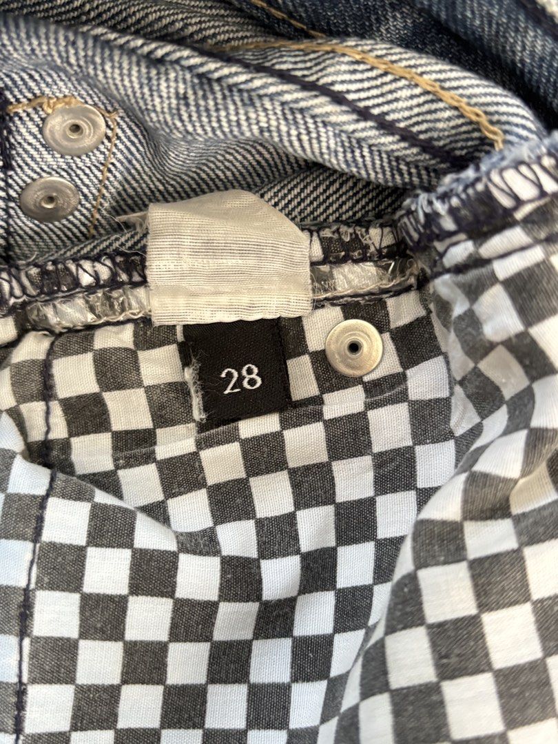 Blue Denim Shorts with Checkered Lining - Size 28 (Category: Shorts) located in Paranaque City. Submitted by ggg.bin (Listing ID 1462783161, Image 3). Description: - Blue denim shorts - Size 28 - Distressed look with frayed hem - Checkered lining inside - Zip fly with button closure - Front and back pockets.