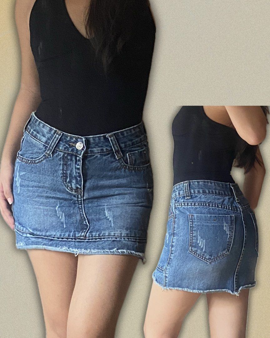 Blue Distressed Denim Mini Skirt (Category: Skirts) located in Manila. Submitted by yannaapril (Listing ID 1462720214, Image 2). Description: Measurements: (inches) Waist - 24-25 Hips - 31 Length/outseam - 13 - Cute blue denim mini skirt - Frayed hem and distressed details - Classic five-pocket styling - Button and zip closure - Versatile for casual outfits.