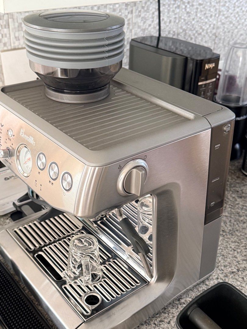 Breville Barista Express Impress Machine with Grinder (Category: Coffee Machines & Makers) located in Manila. Submitted by francispena (Listing ID 1462836933, Image 2). Description: - Breville Barista Express Espresso Machine - Built-in Grinder - Includes Tamper and Portafilter - Comes with Knock Box - Includes 2 Small Espresso Cups - Good Working Order - Perfect for Home Cafe-Quality Coffee - Complete with box - Purchased March 17, 2024 SRP: 750