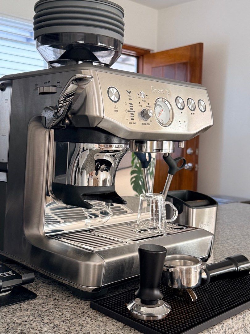 Breville Barista Express Impress Machine with Grinder (Category: Coffee Machines & Makers) located in Manila. Submitted by francispena (Listing ID 1462836933, Image 3). Description: - Breville Barista Express Espresso Machine - Built-in Grinder - Includes Tamper and Portafilter - Comes with Knock Box - Includes 2 Small Espresso Cups - Good Working Order - Perfect for Home Cafe-Quality Coffee - Complete with box - Purchased March 17, 2024 SRP: 750