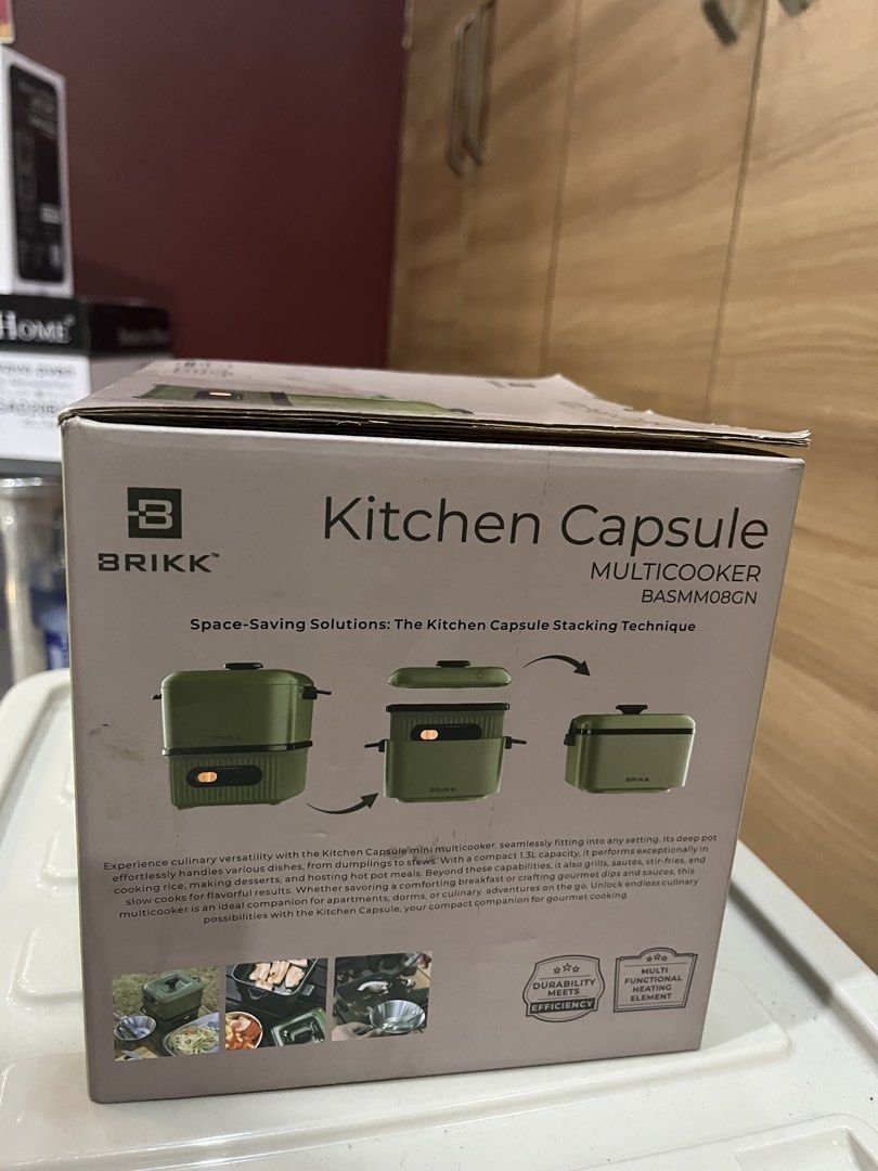 BRIKK Kitchen Capsule Multicooker BASMM08GN (Category: Cookware & Accessories) located in Manila. Submitted by jericho_chan (Listing ID 1462725609, Image 2). Description: - Space-saving design, compact and portable - BRIKK Kitchen Capsule multicooker - Aluminum die-cast heating plate - Low-carbon, flameless design - 1.3L capacity, perfect for small meals - Multifunctional with deep pot and handles - Easy to store.