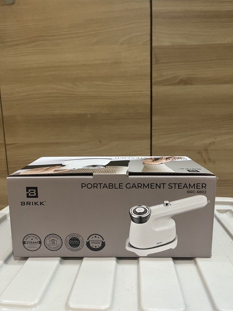 BRIKK Portable Garment Steamer BRC-6802 (Category: Irons & Steamers) located in Manila. Submitted by jericho_chan (Listing ID 1462722494, Image 1). Description: - BRIKK BRC-6802 Portable Garment Steamer - Ideal for quick touch-ups and steaming clothes - Versatile: can steam vertically or horizontally - Compact and easy to use - Leaves clothes looking fresh and wrinkle-free.