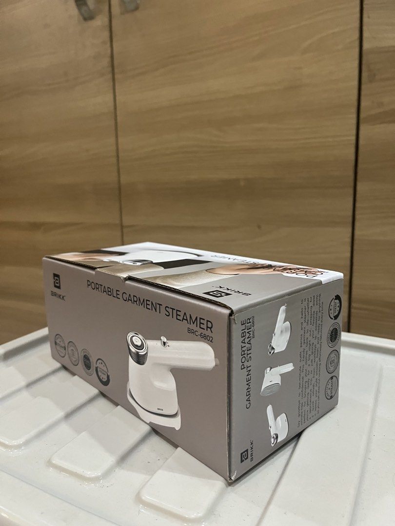 BRIKK Portable Garment Steamer BRC-6802 (Category: Irons & Steamers) located in Manila. Submitted by jericho_chan (Listing ID 1462722494, Image 2). Description: - BRIKK BRC-6802 Portable Garment Steamer - Ideal for quick touch-ups and steaming clothes - Versatile: can steam vertically or horizontally - Compact and easy to use - Leaves clothes looking fresh and wrinkle-free.