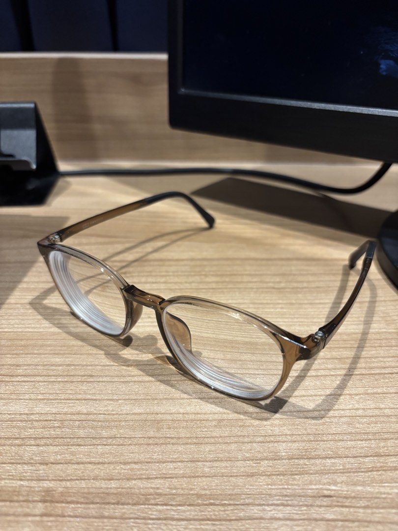 Brown Eyeglasses Frame (Category: Sunglasses & Eyewear) located in Manila. Submitted by enzosells777 (Listing ID 1462817979, Image 1). Description: - Light brown eyeglasses frame - Black accents on the arms - Currently with prescription .