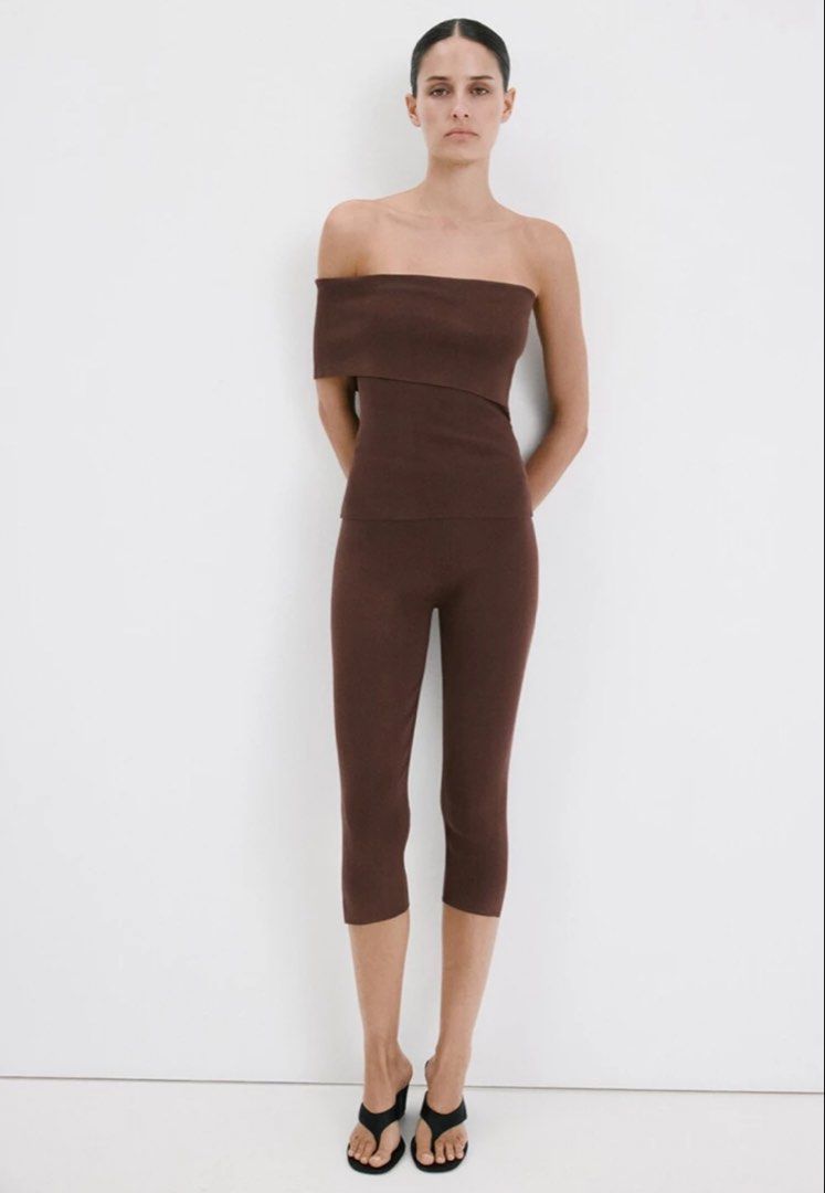 Brown Knit Cropped Leggings with Side Slits (Category: Other Bottoms) located in Taguig. Submitted by juliebonifacio (Listing ID 1462741187, Image 2). Description: - Brown knit cropped leggings - Comfortable stretchy fit - Subtle slit detail at the hem - Great for layering or wearing on their own - Versatile piece for your wardrobe - Looks good with boots or sandals - mall price: 2500.