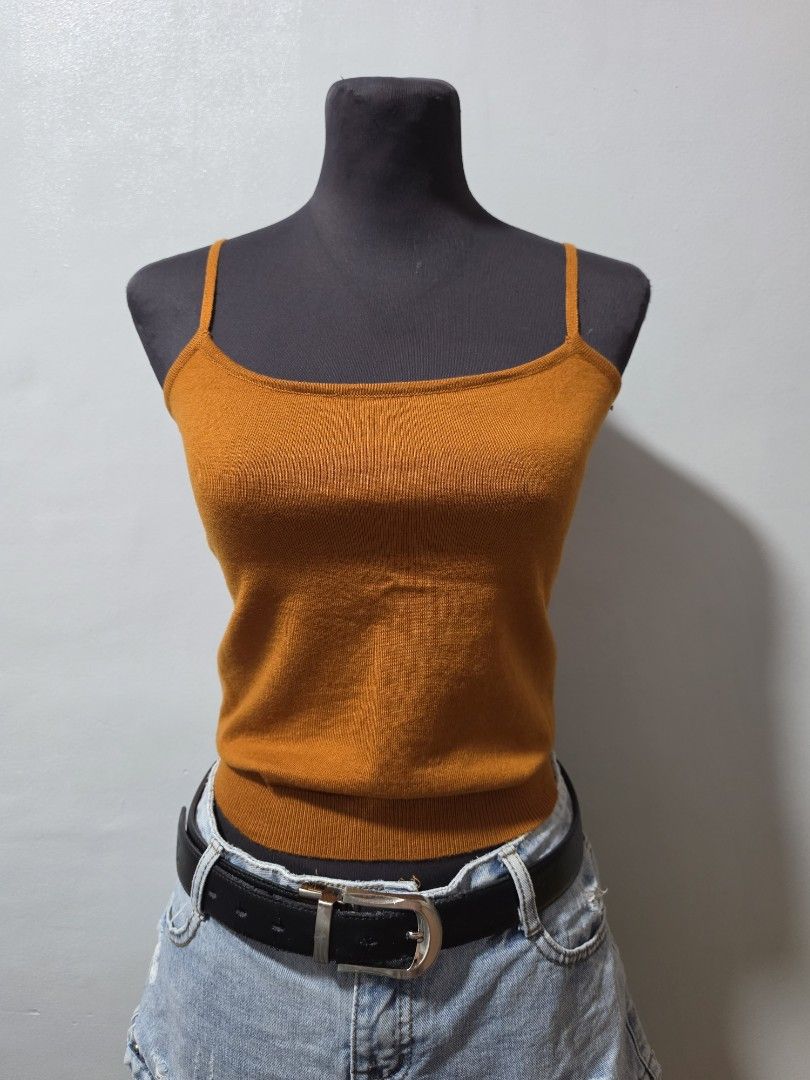 brown Knit Tank Top Spaghetti Straps small (Category: Sleeveless) located in Paranaque City. Submitted by franinnashop (Listing ID 1462688335, Image 1). Description: - Vibrant brown knit tank top - Features delicate spaghetti straps - Ribbed knit texture for a stylish look - Versatile for layering or standalone wear - Easily pairs with jeans, skirts, and other bottoms - A wardrobe essential for effortless styling declittr small paranaque ciry.