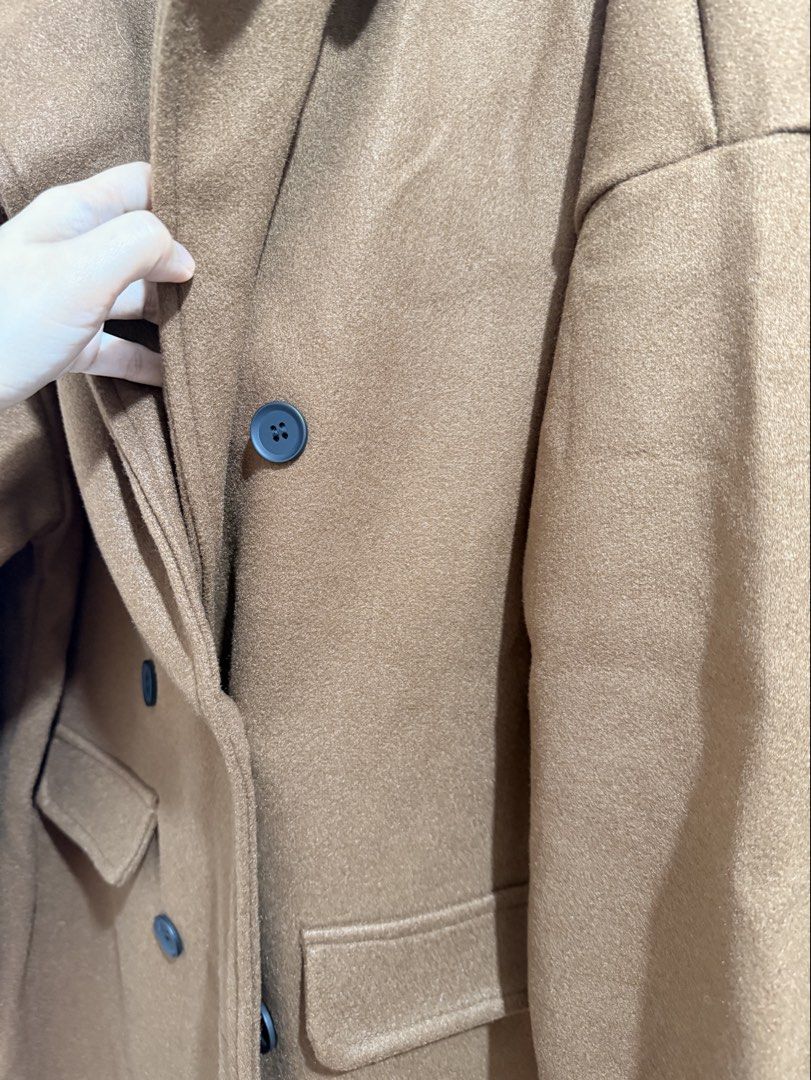 Brown Long Coat/Trench Coat (Category: Coats, Jackets and Outerwear) located in General Trias. Submitted by tinyfits_outgrown (Listing ID 1462884482, Image 3). Description: - Classic brown coat - Button closure - Warm and cozy feel - Ideal for cooler weather - Size: Medium (M) Unused.