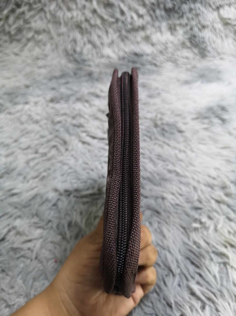 Brownish Zippered Fabric Card Holder (Category: Wallets & Card holders) located in Santa Cruz. Submitted by jmy_surplus.2 (Listing ID 1462790573, Image 2). Description: Size ; L - 5.6 W - 7.6 Color ; Brown Type ; Card Holder Brand ; No brand Material ; Nylon Style ; Brown nylon Zipper Closure card Holder LR 129 JMY 5 Batch #222.
