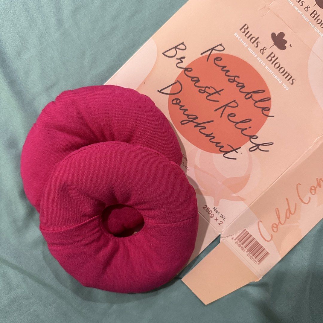 Buds & Blooms Reusable Breast Relief Doughnuts (Category: Breastfeeding & Bottle Feeding) located in Urdaneta. Submitted by oc_decluttering (Listing ID 1462781085, Image 1). Description: Reusable breast relief doughnuts. 2pcs in color pink. With box. Excellent used condition. Rfs : not using it anymore Selling for 150php (slightly negotiable) Mop: gcash/bank transfer. Payment first before shipping. Shipping via j&t only. No sco/tco. Buyer to shou