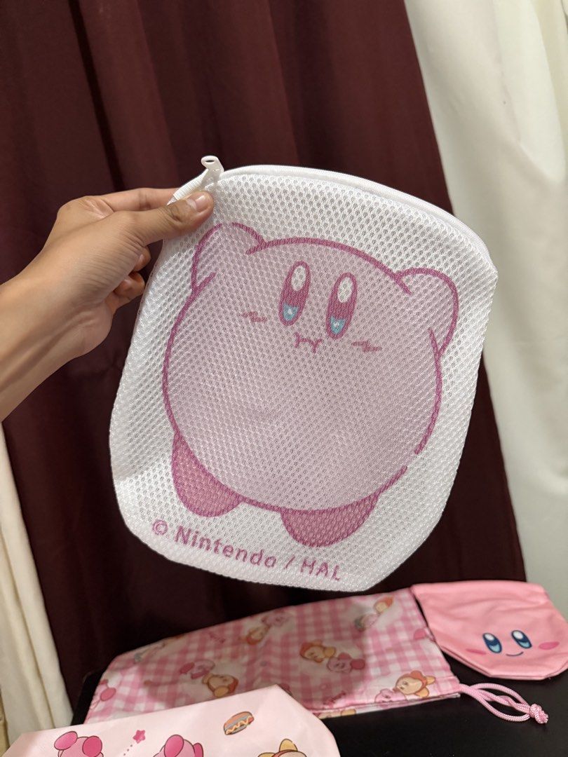 Bundle Cute Kirby Tote Bag, Laundry Pouch, Drawstring Bags & Pouch (Category: Purses & Pouches) located in Caloocan City. Submitted by rohllee (Listing ID 1462723179, Image 3). Description: - Adorable Kirby themed bag set! - Includes: 1 Tote Bag, 1 Zippered Mesh Laundry Pouch, 2 Drawstring Pouches - One drawstring pouch features a cute checkered pattern. - Perfect for organizing your essentials or as a delightful gift for any Kirby enthusiast. - 