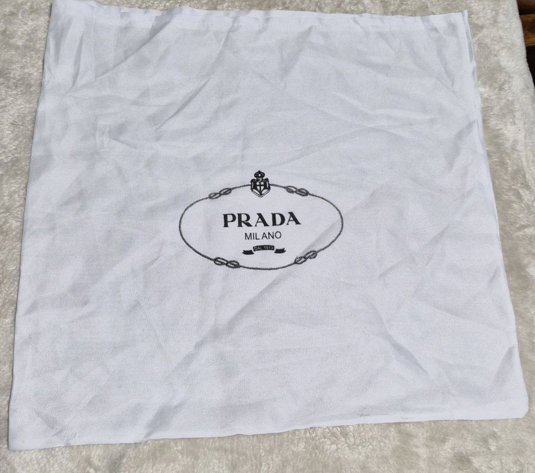Bundle dust bag - Prada, Longchamp, Moins De Dust Bags (Category: Baby Monitors) located in Mandaue City. Submitted by chuchi152615 (Listing ID 1462742738, Image 1). Description: - Bundle includes: 1 Prada dust bag, 1 Longchamp dust bag, 1 Moins Studio Design dust bag. - Ideal for protecting your handbags and other accessories. - Keeps your items safe and dust-free. - Measurements available in photos. - Great for storage needs..