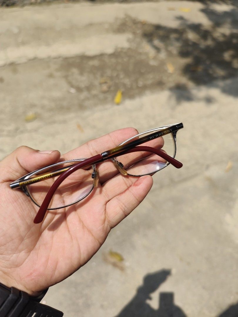 Burberry Frame (Category: Sunglasses & Eyewear) located in Cebu City. Submitted by icoolectnsellect (Listing ID 1462740268, Image 2). Description: Bought at Garage Sale. Authenticity not Guaranteed, di ko alam if legit or Fake. Buy @ your own Risk. All EyeGlasses or Sun Glasses ay may Grado or Prescription Glasses. Please be careful para di masira mata nyo, you can change the lens and frame na lng kunin. Salamat location CEBU J&T or LBC COP Shipp