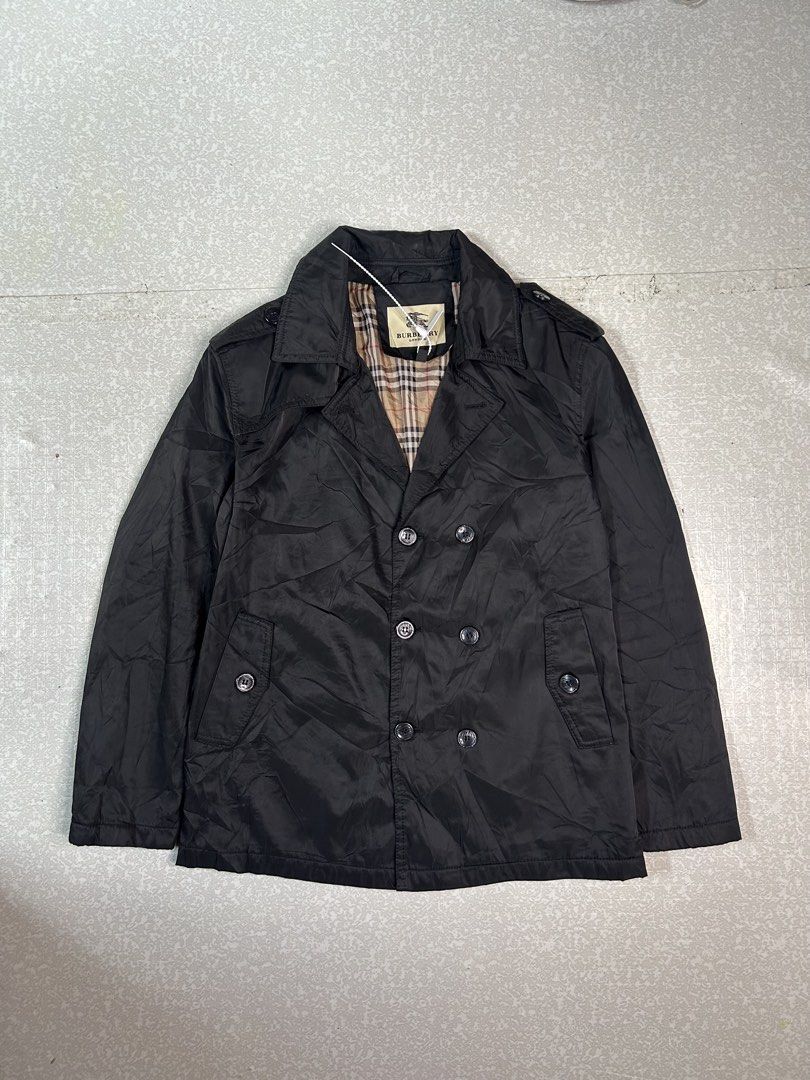 Burberry London Black Double Breasted Jacket Nova Check Lining (Category: Coats, Jackets and Outerwear) located in Dasmarinas. Submitted by insaurigaj60770 (Listing ID 1462716698, Image 1). Description: - Classic Burberry London jacket - Black, double-breasted style - Iconic Nova Check lining - Lightweight material, great for layering - Two front pockets - Button closure.