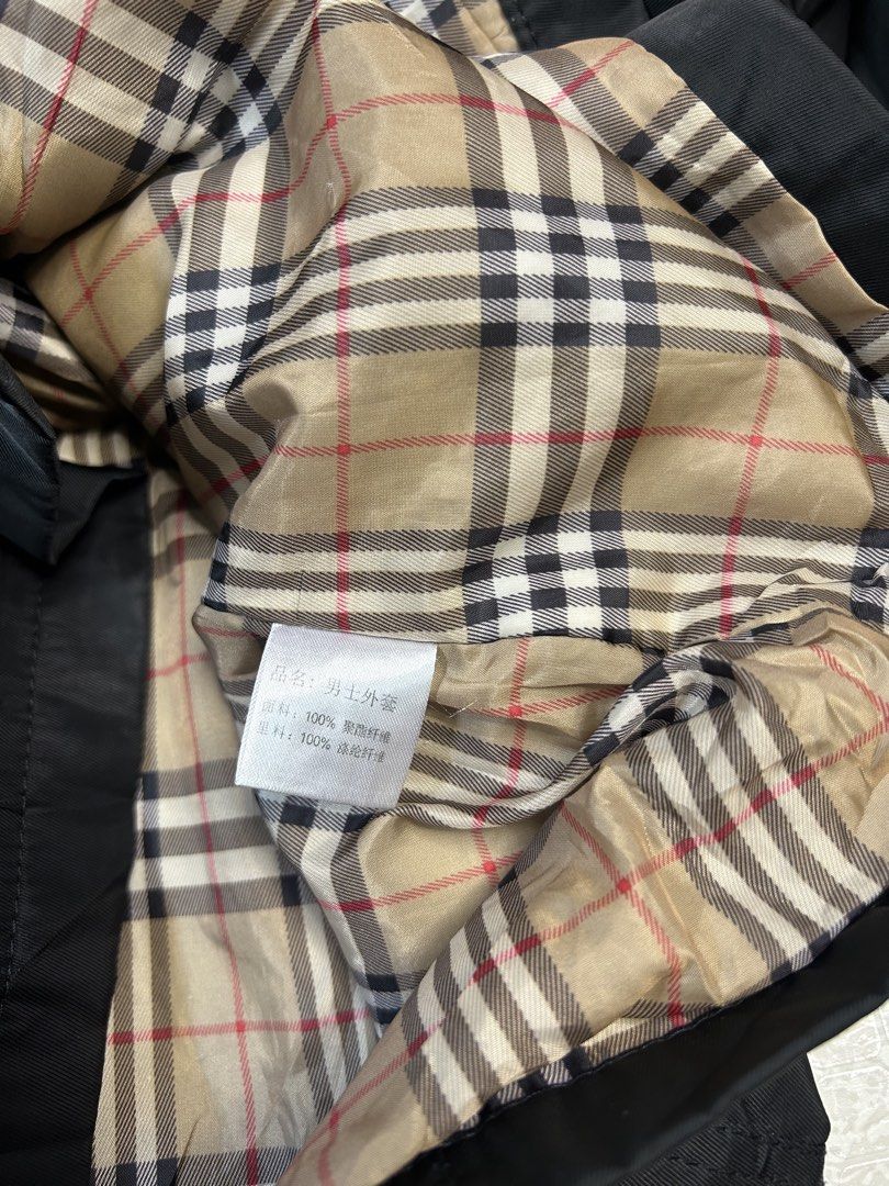 Burberry London Black Double Breasted Jacket Nova Check Lining (Category: Coats, Jackets and Outerwear) located in Dasmarinas. Submitted by insaurigaj60770 (Listing ID 1462716698, Image 3). Description: - Classic Burberry London jacket - Black, double-breasted style - Iconic Nova Check lining - Lightweight material, great for layering - Two front pockets - Button closure.