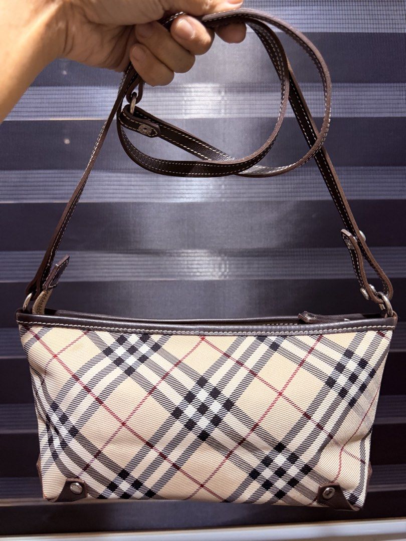 Burberry Nova Check Canvas Leather Trim Shoulder Bag (Category: Luxury Bags & Wallets) located in Tarlac. Submitted by rizasdeclutteringonline (Listing ID 1462861167, Image 1). Description: - Iconic Burberry Nova Check pattern - Durable canvas and leather trim - Adjustable shoulder strap(pwedeng gawin pochette,handbag,shoulder bag, crossbody) - Spacious interior for essentials - Ideal for everyday use - A timeless addition to your collection -no 