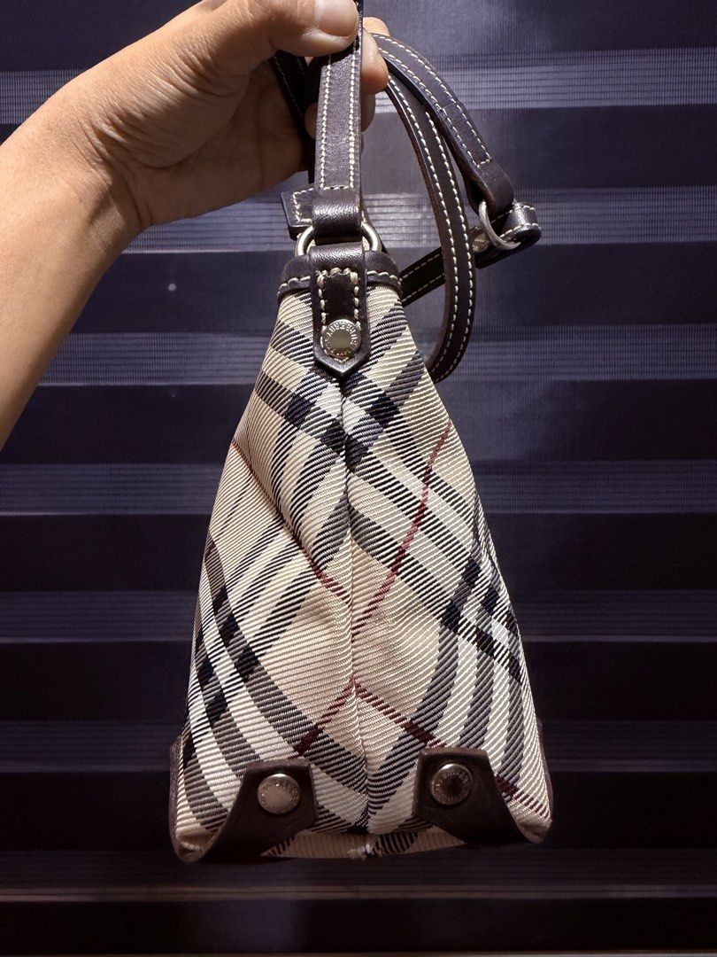 Burberry Nova Check Canvas Leather Trim Shoulder Bag (Category: Luxury Bags & Wallets) located in Tarlac. Submitted by rizasdeclutteringonline (Listing ID 1462861167, Image 2). Description: - Iconic Burberry Nova Check pattern - Durable canvas and leather trim - Adjustable shoulder strap(pwedeng gawin pochette,handbag,shoulder bag, crossbody) - Spacious interior for essentials - Ideal for everyday use - A timeless addition to your collection -no 