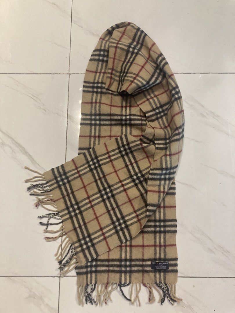 Burberry Nova Check Scarf (Category: Scarves) located in Quezon City. Submitted by janisu0303 (Listing ID 1462844573, Image 1). Description: - Classic Burberry Nova Check Pattern - 70 x 11.5 - 6500 php - Material: 100% Lambswool - Dimensions: Approx. 160cm (length) x 30cm (width) - Fringe: Approx. 7cm on each end - Perfect for staying warm and stylish - Care Instructions: Dry clean only Scarf Scarves Gucci Fendi Hermes Chanel LV.