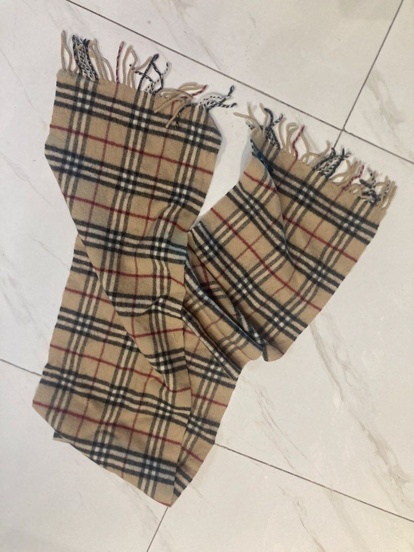 Burberry Nova Check Scarf (Category: Scarves) located in Quezon City. Submitted by janisu0303 (Listing ID 1462844573, Image 3). Description: - Classic Burberry Nova Check Pattern - 70 x 11.5 - 6500 php - Material: 100% Lambswool - Dimensions: Approx. 160cm (length) x 30cm (width) - Fringe: Approx. 7cm on each end - Perfect for staying warm and stylish - Care Instructions: Dry clean only Scarf Scarves Gucci Fendi Hermes Chanel LV.