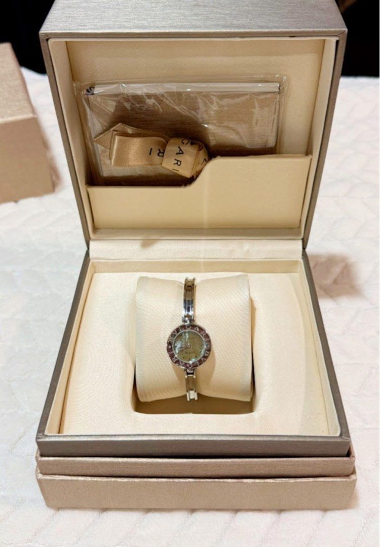 Bvlgari Watch (Category: Luxury Watches) located in Quezon City. Submitted by liezl.marie (Listing ID 1462831000, Image 1). Description: A stainless steel Bv/gar! B.zero1 bangle watch with an engraved bezel and a mother-of-pearl dial. - For small to mediun wrist only 44,500 Open for layaway. Disclaimer: We are not affiliated, associated, authorized, endorsed by or in any way officially connected with any other company or luxury brand. All copyrig