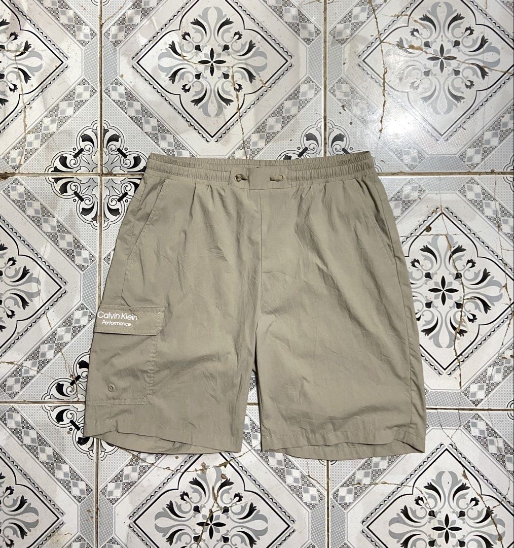 Calvin Klein Cargo Shorts (Category: Shorts) located in Cebu City. Submitted by refinds.cebu (Listing ID 1462721914, Image 2). Description: Calvin Klein Short Size: Large on tag Dimension:32 width x 20 length Leg opening: 10 Excellent condition.