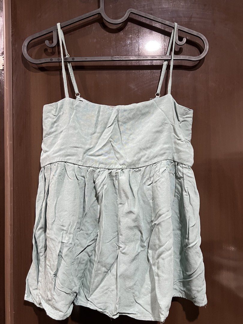Cami Top (Category: Sleeveless) located in Manila. Submitted by shinneee (Listing ID 1462847573, Image 1). Description: TEAL CAMI TOP size: M-L - lightly used just needs .