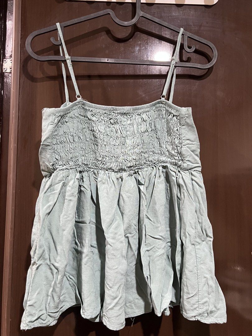 Cami Top (Category: Sleeveless) located in Manila. Submitted by shinneee (Listing ID 1462847573, Image 2). Description: TEAL CAMI TOP size: M-L - lightly used just needs .