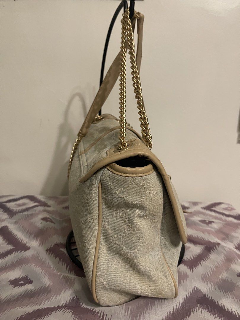 Candy Rose Beige Monogram Shoulder Bag with Gold Chain (Category: Shoulder Bags) located in General Trias. Submitted by laconchita_tesoros (Listing ID 1462728684, Image 2). Description: - Beige shoulder bag from Candy Rose - Subtle all-over monogram pattern - Gold chain strap with leather trim - Magnetic flap closure - Interior: Light stains present - Exterior: Minor scuffs on leather trim, small marks on the back needs cleaning.