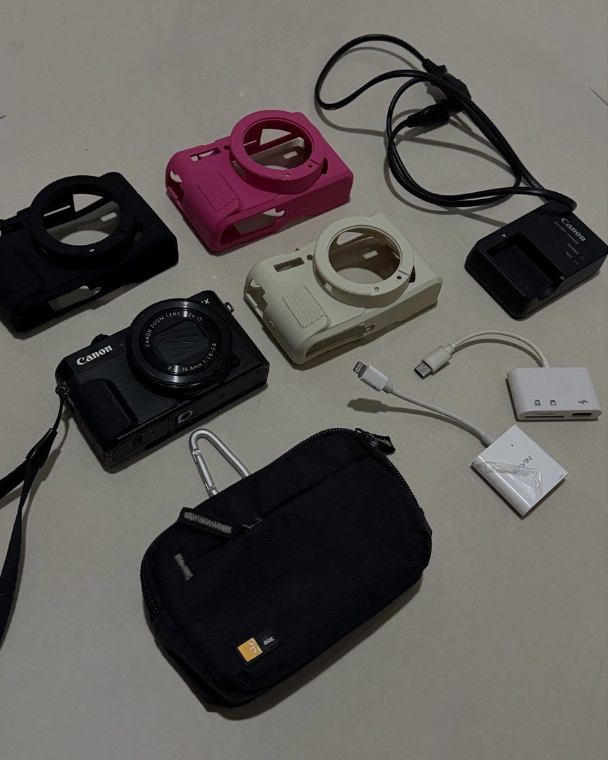 Canon Camera Bundle with Cases, Charger, and Accessories (Category: Cameras) located in Quezon City. Submitted by notriries (Listing ID 1462879287, Image 1). Description: - great performance - no internal issues - with minimal cosmetic condition Inclusions: - Canon Camera - 32gb SD Card - Black Carrying Pouch - Canon Battery Charger - 3 Silicone Camera Cases (Black, Pink, Cream) - Card Reader RFS: bibili ng mark 3 Loc: timog ave, QC CAN DO MEETUP