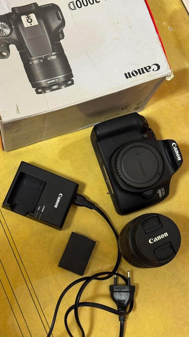 Canon EOS 2000D DSLR Camera with Kit Lens (Category: Cameras) located in Bacoor. Submitted by mmsibshoppe (Listing ID 1462869509, Image 1). Description: - Canon EOS 2000D DSLR Camera Body - Original Battery - Original Charger - Original Box - Ideal for beginner photographers - Ready for your next adventure!.