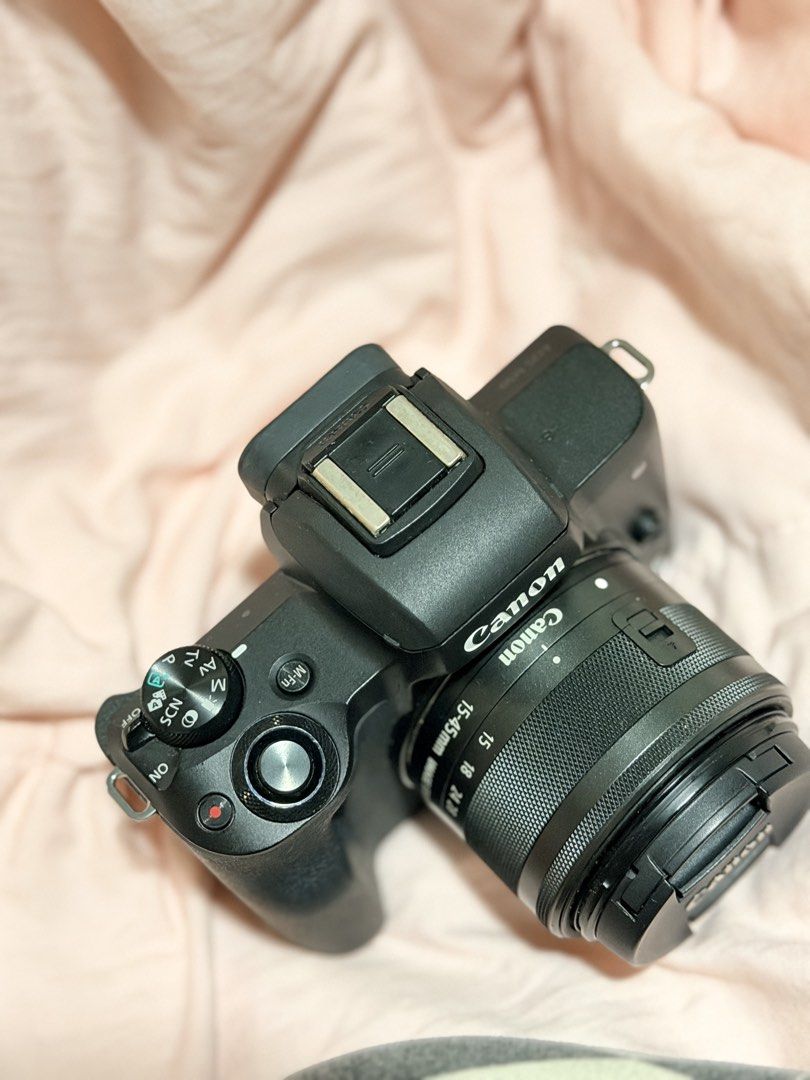 Canon EOS M50 Mirrorless Camera with 15-45mm Lens (Category: Cameras) located in Manila. Submitted by andrea54897 (Listing ID 1462769901, Image 2). Description: - Canon EOS M50 Mirrorless Camera - Includes 15-45mm lens and charger - Fully functional flip screen, great for vlogging - Excellent for both photography and video - Selling because it's no longer frequently used - Feel free to ask any questions!.