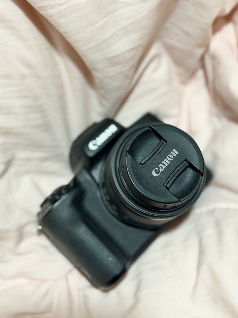 Canon EOS M50 Mirrorless Camera with 15-45mm Lens (Category: Cameras) located in Manila. Submitted by andrea54897 (Listing ID 1462769901, Image 1). Description: - Canon EOS M50 Mirrorless Camera - Includes 15-45mm lens and charger - Fully functional flip screen, great for vlogging - Excellent for both photography and video - Selling because it's no longer frequently used - Feel free to ask any questions!.