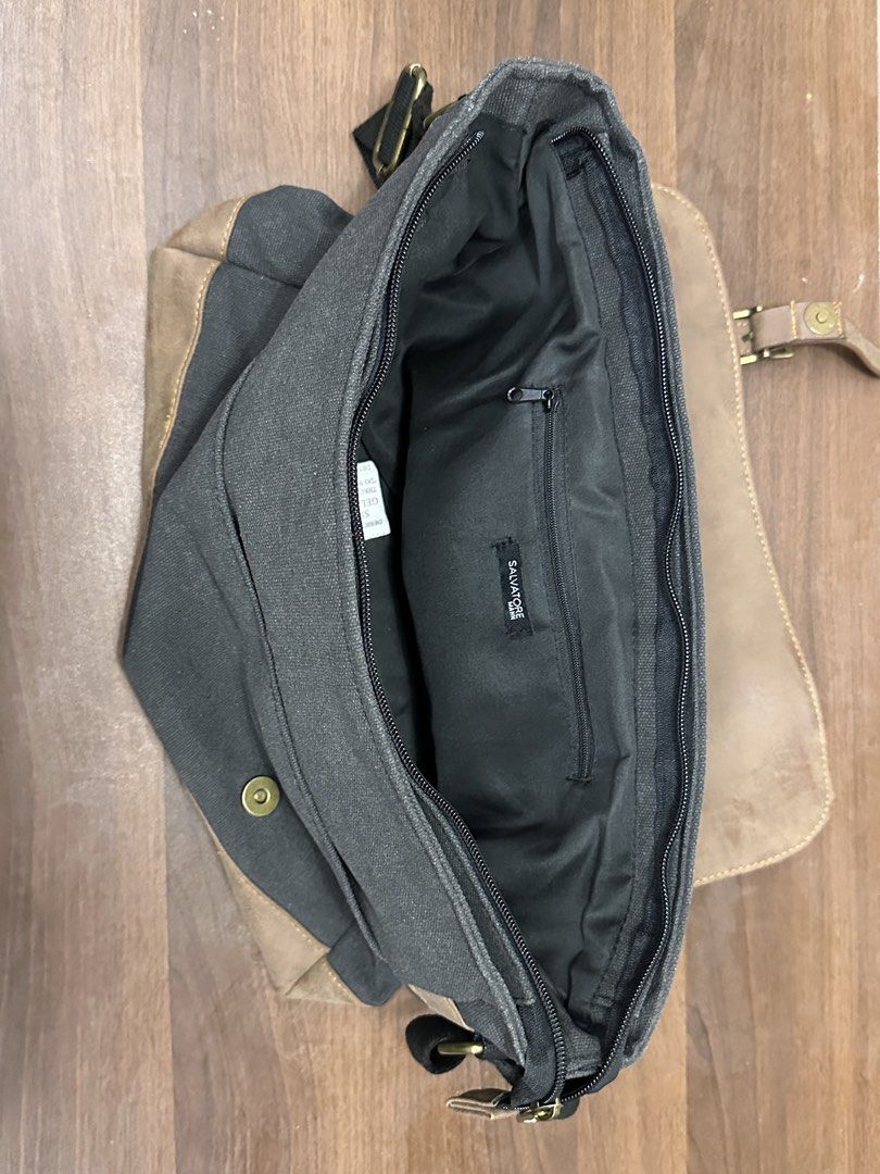 Canvas & Faux Leather Messenger Bag (Category: Sling Bags) located in Manila. Submitted by itsaladean (Listing ID 1462870322, Image 3). Description: Salvatore Mann Barely used. Good as new, the design is kinda vintage. It is not old Leather and Denim Bought it for 1,299 Selling it for 450 RFS: Decluttering - Main zippered compartment for secure storage. - Internal zip pocket for organizing smaller items. - Adjustable strap for a comfortable, cust